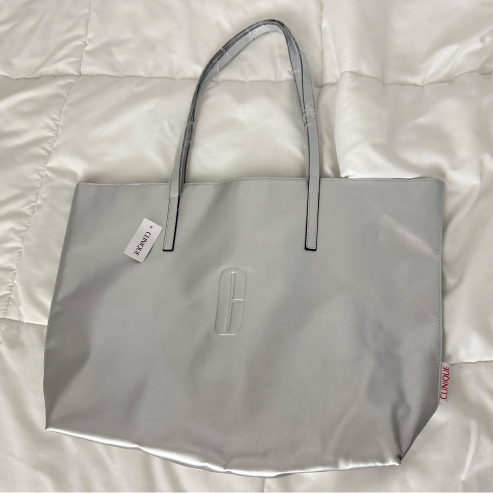 metallic silver Clinique tote bag
